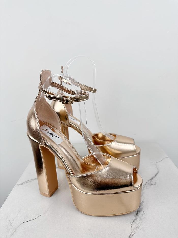 Decollete oro con plateau store